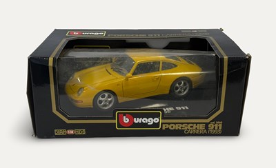 Lot 12 - 1993 Porsche 911 Carrera 1/18 scale Burago model, in box.