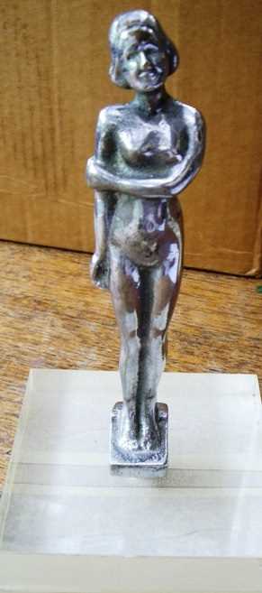 Lot 64 - female nude motoring mascot