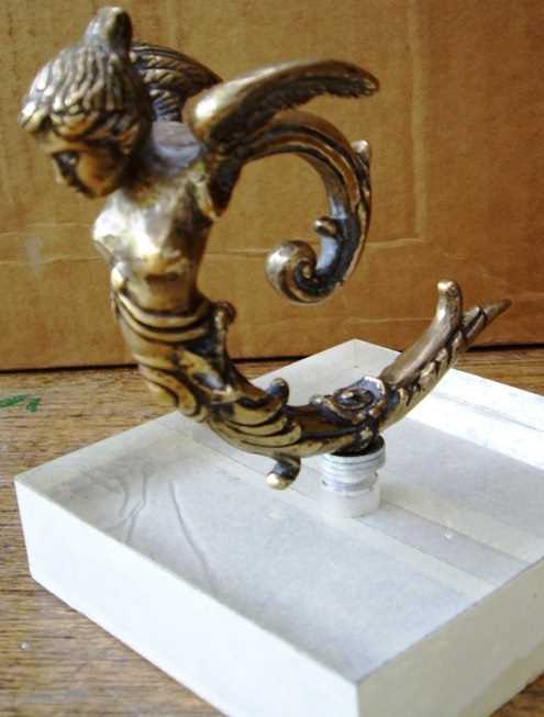 Lot 65 - mythical winged figure mascot